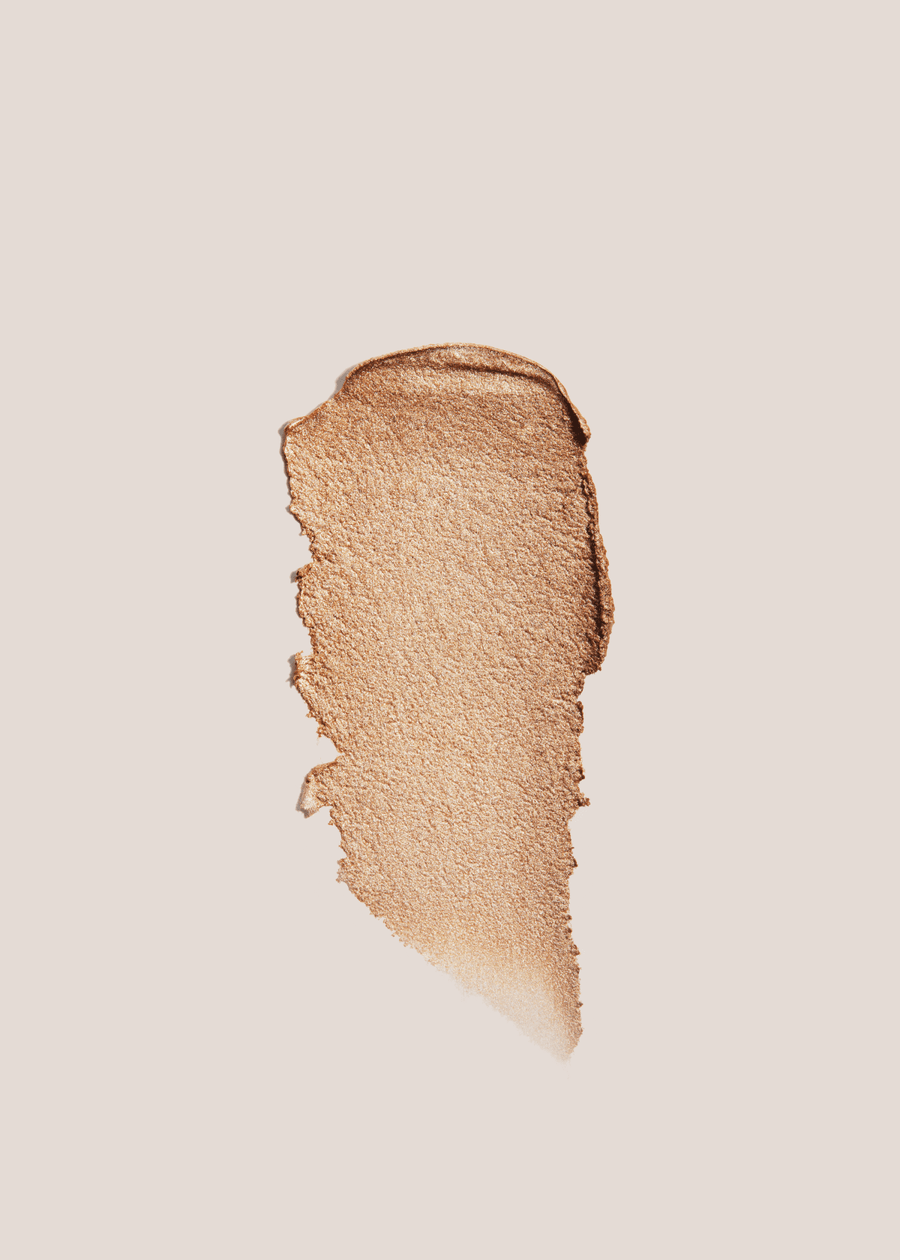 Swatch of champagne Cream Highlighter from Minori